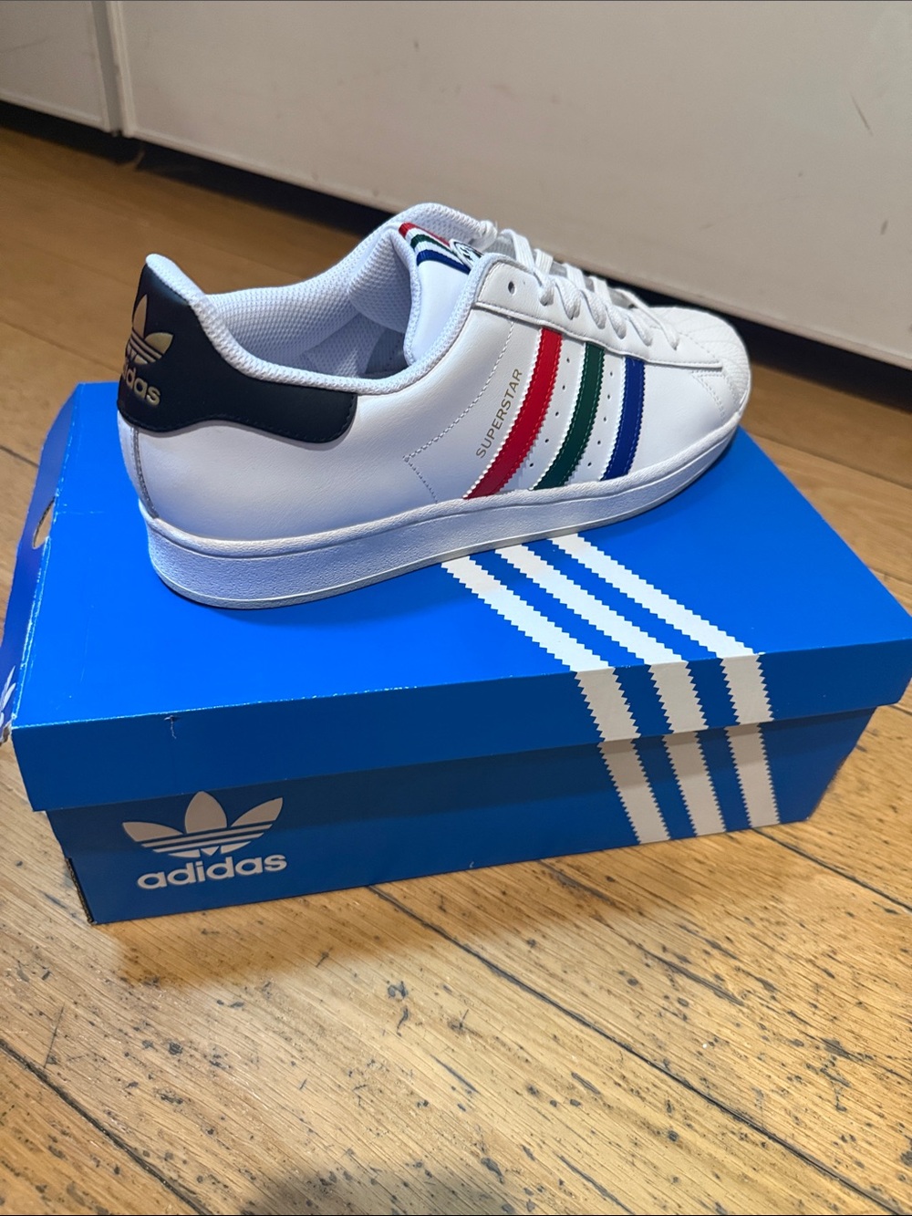 adidas White Leather Sneaker with Red, Green & Blue Stripes. Superstar One!